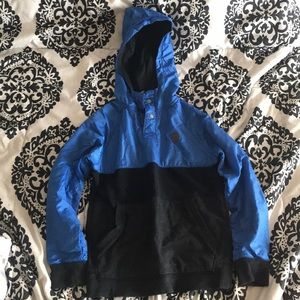 Volcom blue and black hooded sweater.